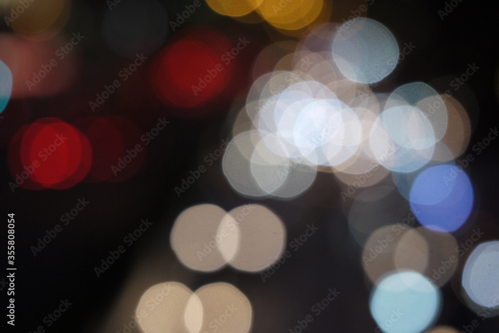 Colorful lens flare dot from the head lamp of the traffic
Colorful lens flare dot from the head lamp of the traffic