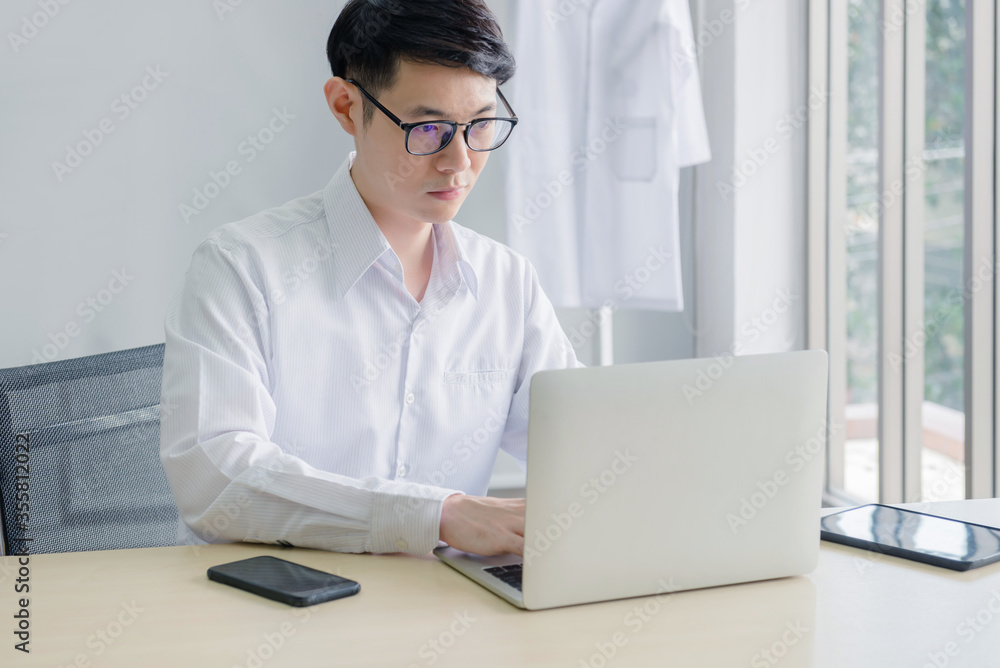 young doctor working at office young doctor working at office