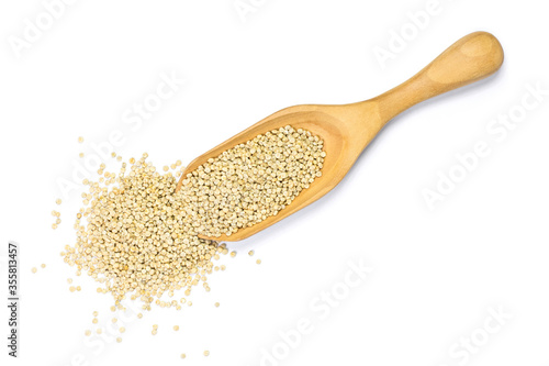 Closeup real quinoa seeds ( Chenopodium ) in wooden spoon isolated on white background. Healthy eating, superfood and supplement concept. Top view. Flat lay. 