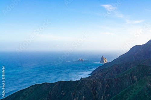 The beautiful Anaga mountains near Tangana with the rocks Los Galiones in the sea, Tenerife, Spain photo