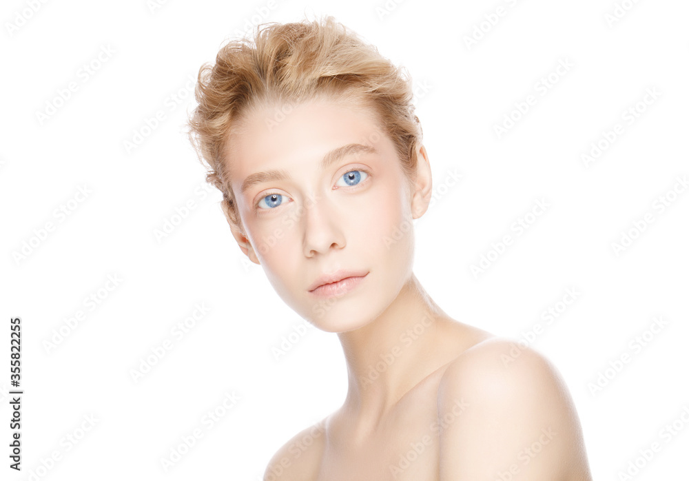 Young beautiful blonde woman with blue eyes standing with naked shoulders, concept of female skin care and beauty, isolated on white Young beautiful blonde woman with blue eyes standing with naked shoulders, concept of female skin care and beauty, isolated on white