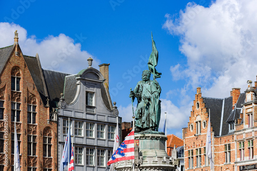 The statue of Jan Breydel and Pieter de Coninck hold the middle of the square. Bruges, Belgium,