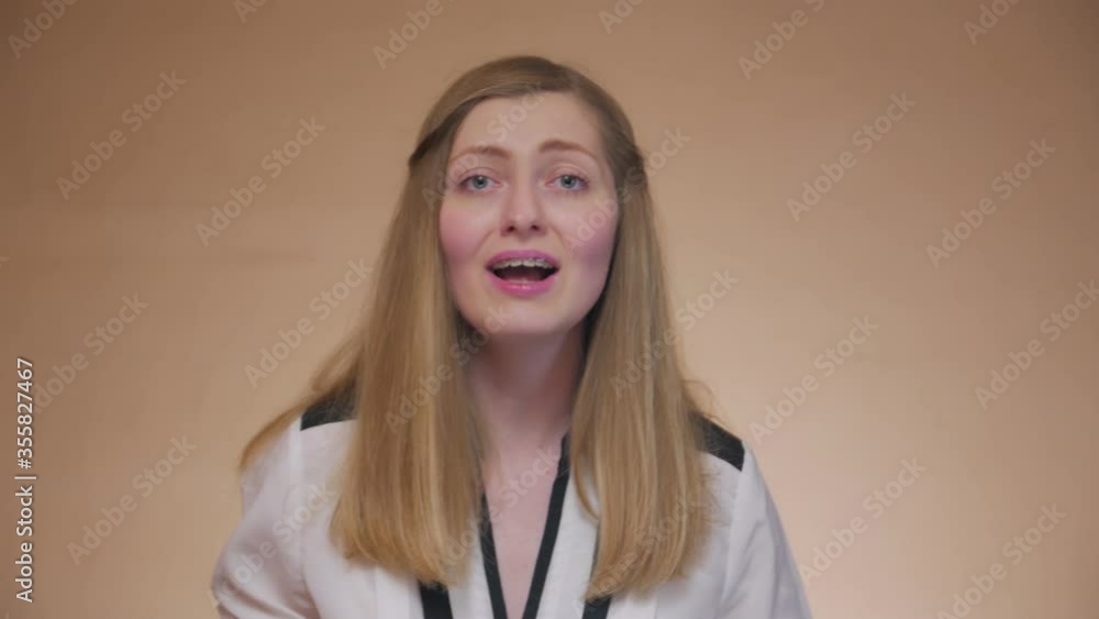 Girl sing bad singer front portrait learning to sing young woman with braces caucasian white 30 years old failed badly take Girl sing bad singer front portrait learning to sing young woman with braces caucasian white 30 years old failed badly take