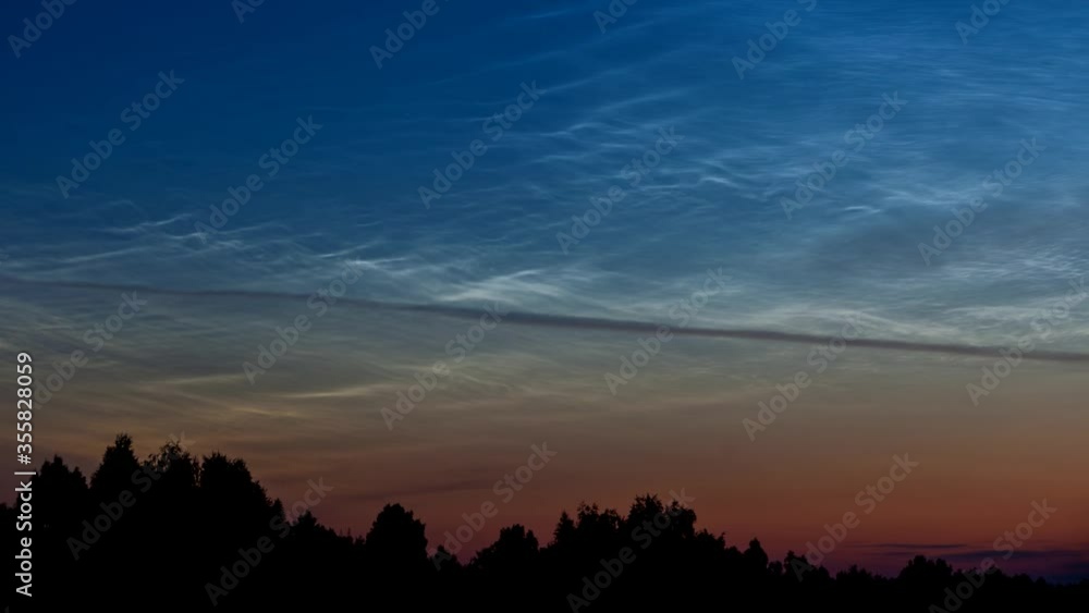 Noctilucent clouds in the night sky (Close up). Timelapse. Noctilucent clouds in the night sky (Close up). Timelapse.