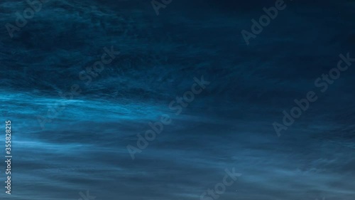 Noctilucent clouds in the night sky (Close up). Timelapse. photo