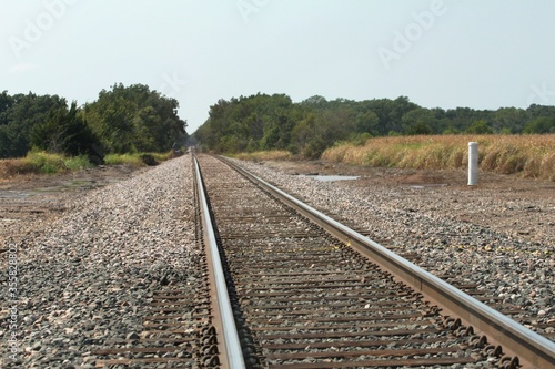 Railroad track.Railroad tracks passing through farmlands.