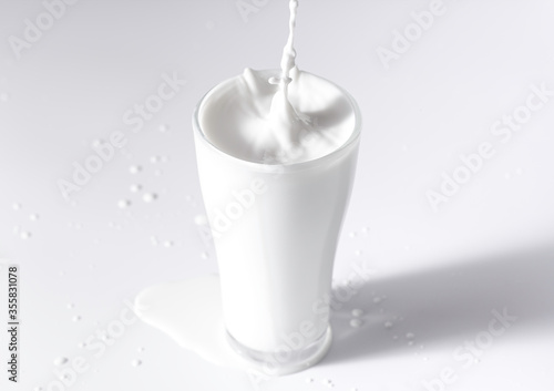 Glass of milk isolated on white background. Full glass of milk.