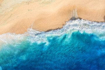 Sierkussen Luchtfoto strand Golven Bali blauw water dronebeeld  © biletskiyevgeniy