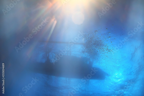 sun rays scuba reef / blue sea, abstract background, sunny day, rays in water