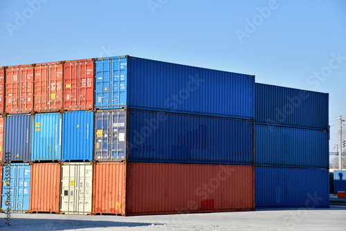 International Container Terminal. Cargo sea containers in port for shipping. Import volumes to be quite depressed due to blank sailings related to the coronavirus disease (COVID-19)
