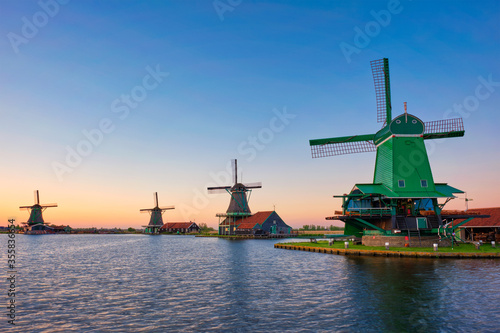 Netherlands rural lanscape - windmills at famous tourist site Zaanse Schans in Holland. Zaandam, Netherlands photo