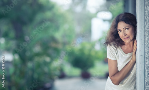 Free Download Outdoor portrait of a beautiful senior woman - GFXLoad