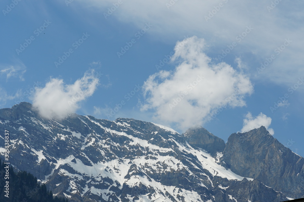 Rocky slopes of the Alps showing the rests of snow in the springtime in Engelberg region canton Obwalden in Switzerland