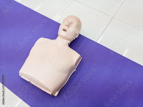 Demonstration of first aid training with dummy