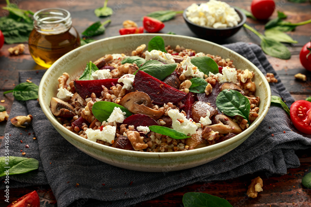 Buckwheat and beetroot salad with mushroom, walnut, spinach and feta cheese. healthy diet food Buckwheat and beetroot salad with mushroom, walnut, spinach and feta cheese. healthy diet food