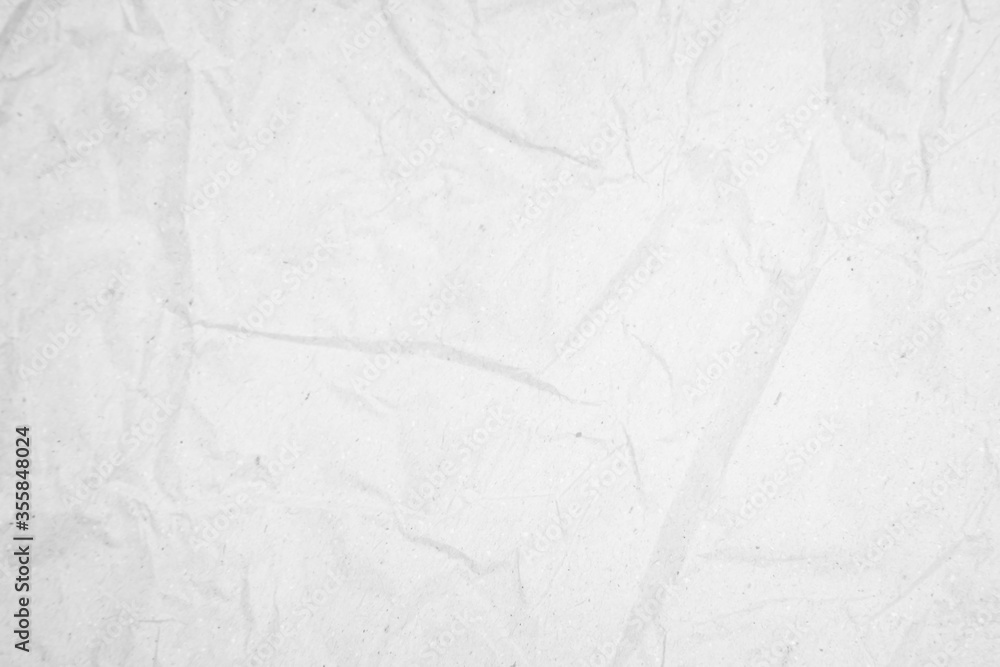 White recycled craft paper texture as background. Grey paper tex White recycled craft paper texture as background. Grey paper tex