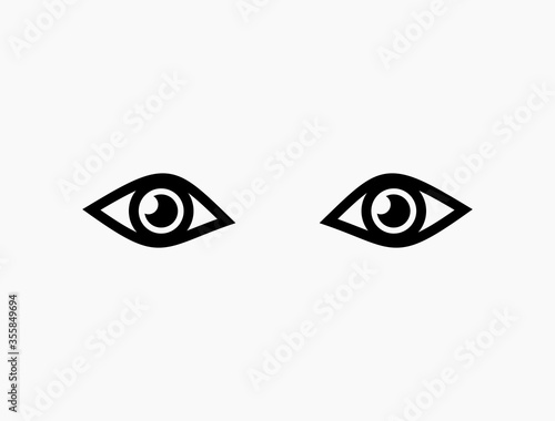 Vector illustration of two human eyes on a light background.