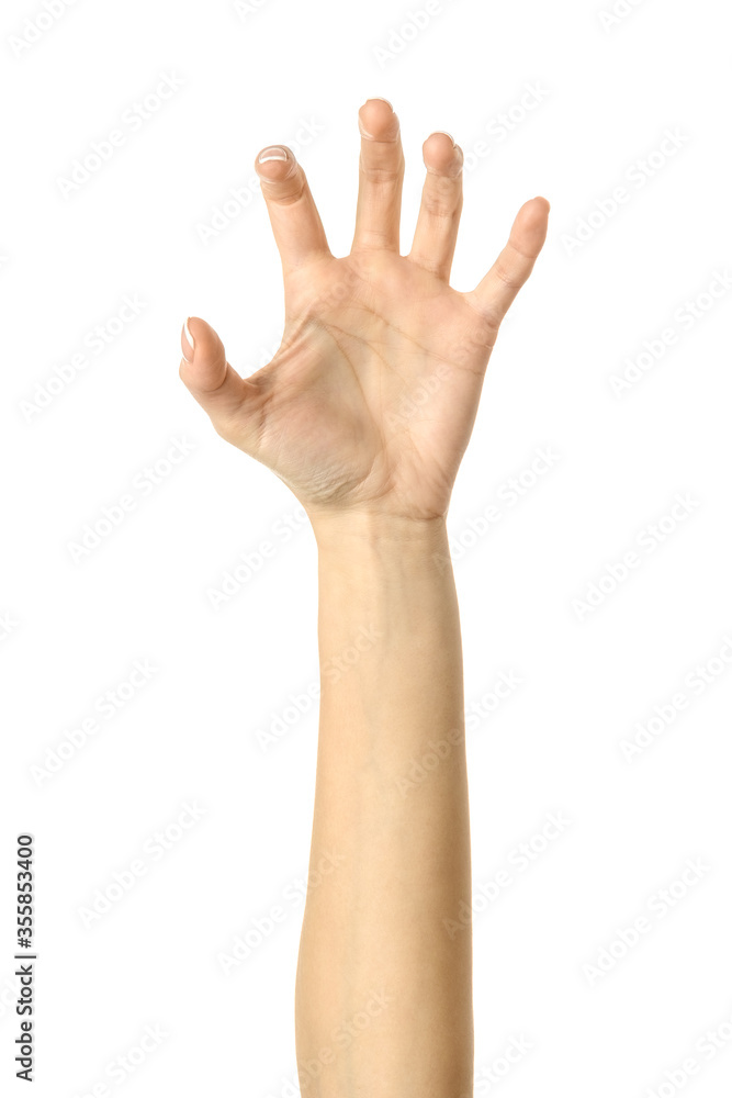 Pulling, grabbing, reaching or scratching. Woman hand gesturing isolated on white Pulling, grabbing, reaching or scratching. Woman hand gesturing isolated on white
