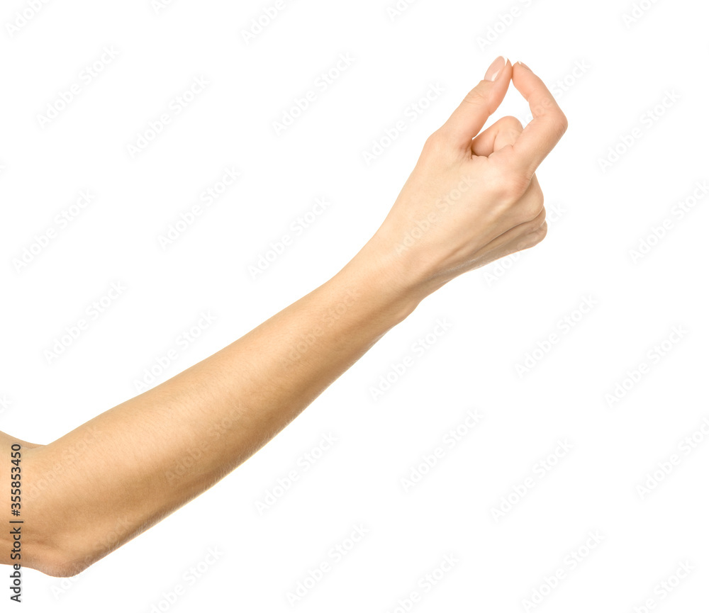 Measuring invisible item. Woman hand gesturing isolated on white Measuring invisible item. Woman hand gesturing isolated on white