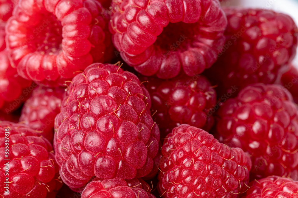 Raspberries close-up. Macro image of fresh raspberries Raspberries close-up. Macro image of fresh raspberries