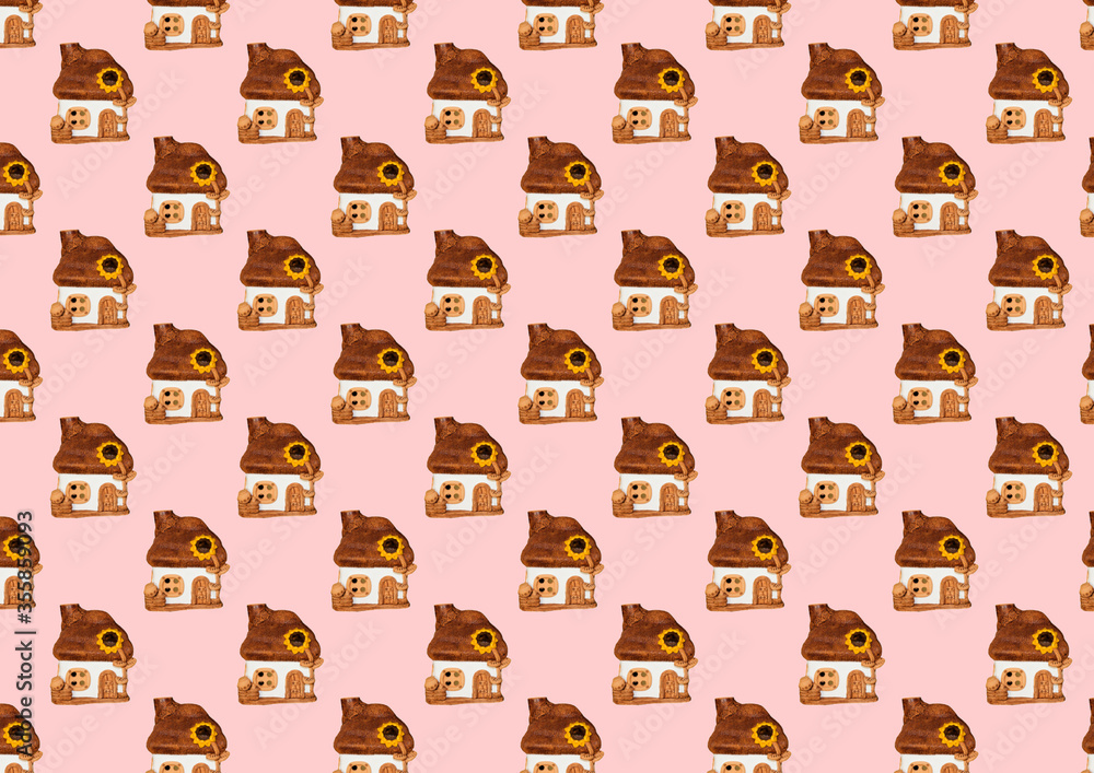 Pattern with a house. Toy house on a pink background. Pattern with a house. Toy house on a pink background.