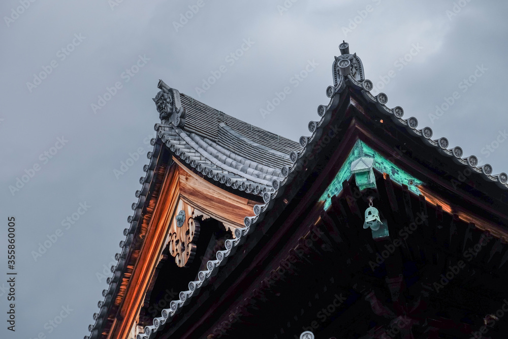 The Japanese style roof of one of the pavilion in a temple. The Japanese style roof of one of the pavilion in a temple.