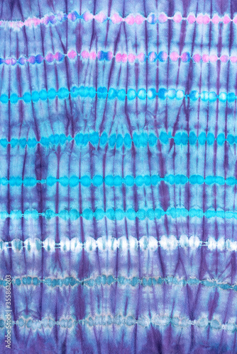 stripe tie dye pattern hand dyed on cotton fabric abstract texture background.