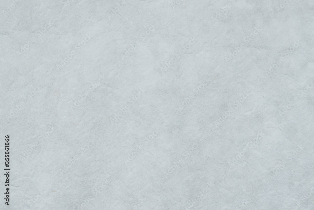 Paper white background from Japanese hand made pastel craft grey white mulberry flower rough textured. Recycled plain clean eco friendly kraft handmade gray natural material for Christmas decoration. Paper white background from Japanese hand made pastel craft grey white mulberry flower rough textured. Recycled plain clean eco friendly kraft handmade gray natural material for Christmas decoration.