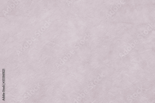 Paper white pink background from Japanese hand made pastel craft soft purple mulberry flower rough textured. Recycled plain clean eco friendly kraft handmade natural material for Christmas decoration.