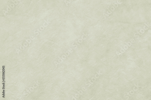 Paper white cream background from Japanese hand made pastel craft yellow white mulberry flower rough textured. Recycled plain clean eco friendly kraft handmade gray natural material 