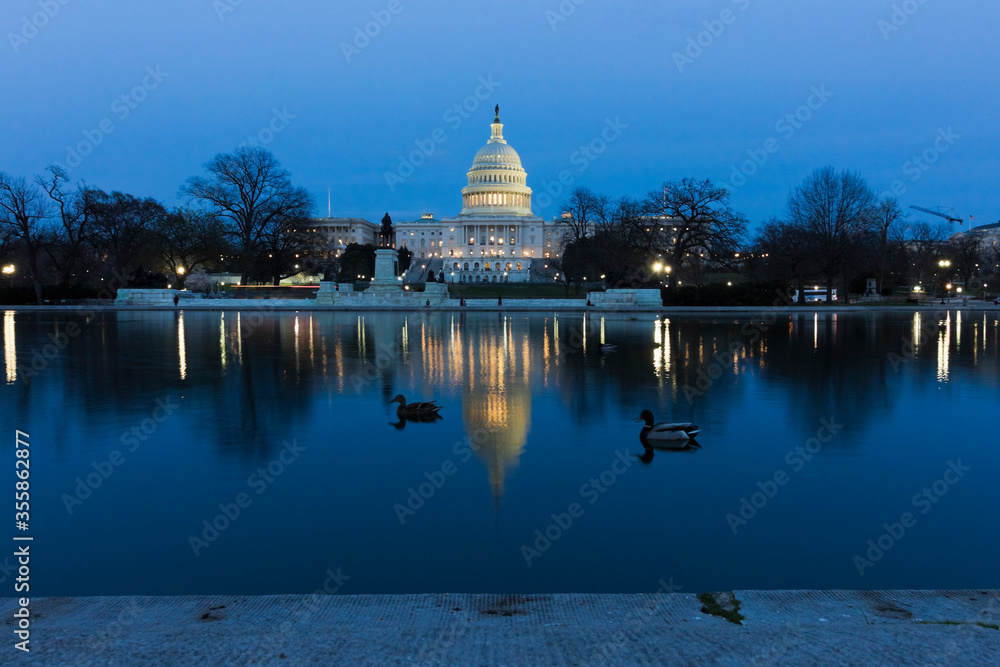 Night-time city vista from Union Square looking east across the Capitol Reflecting Pool towards the United States Capitol Building, Capitol Hill, Washington DC