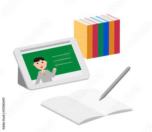 オンライン学習のイメージ。タブレット端末とノートと参考書。