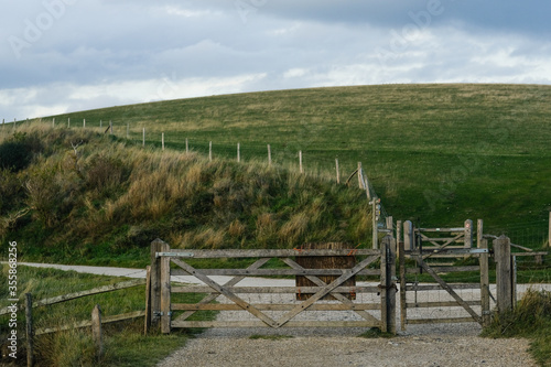  view of a wooden fence in the open spaces of england 