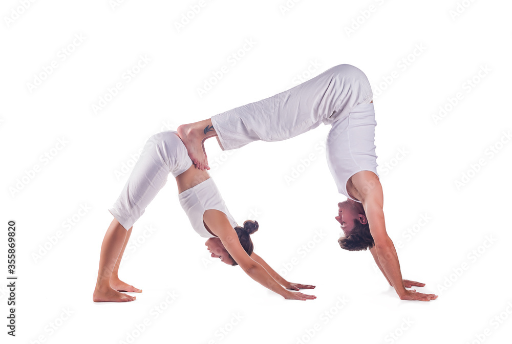 Naklejka premium Couple practicing acro yoga