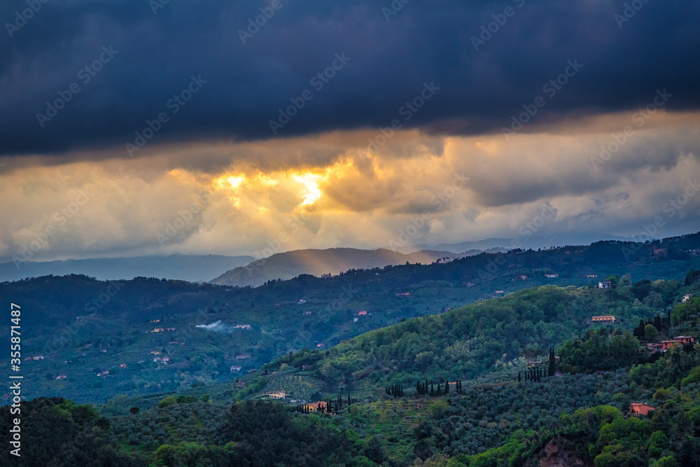 Sunset in landscape above Montecatini Terme town in Tuscany, Italy, Europe.