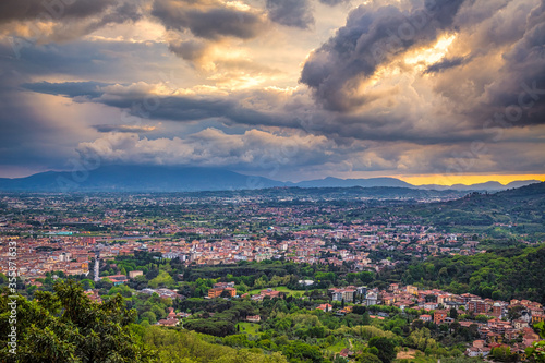 Sunset above Montecatini Terme town in Tuscany, Italy, Europe.