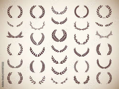 Collection of different golden silhouette laurel foliate and wheat wreaths depicting an award, achievement, heraldry, nobility, emblem. Vector illustration.