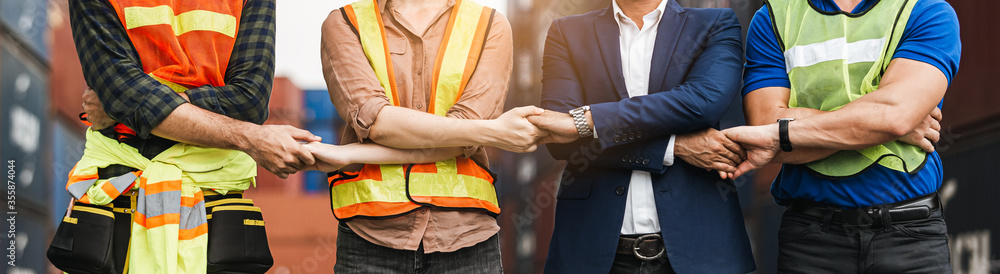 Teamwork engineer technician and foreman shaking hands work successful, connection partnership successful concept.