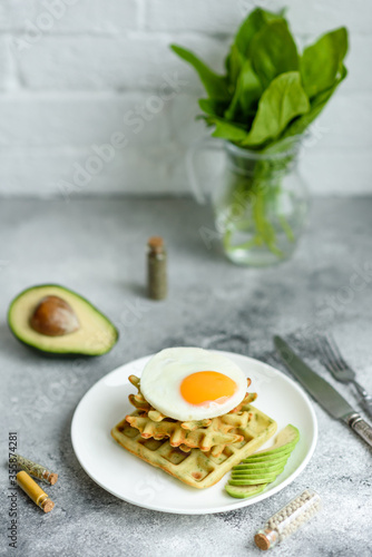Fresh delicious and nutritious breakfast with waffles with spinach