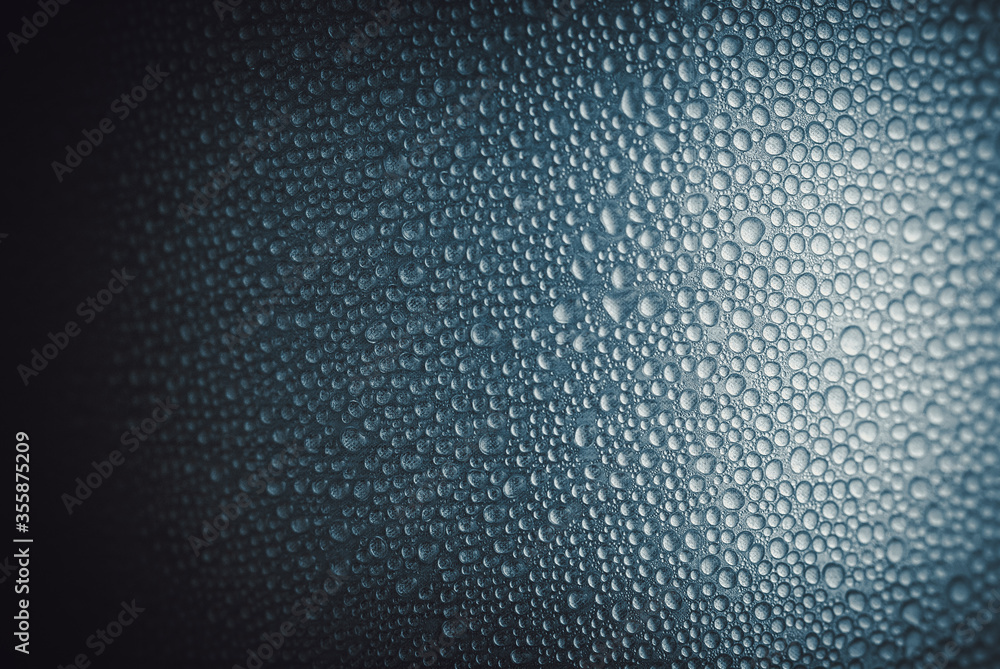 Water drops on dark blue background. Water drops on dark blue background.