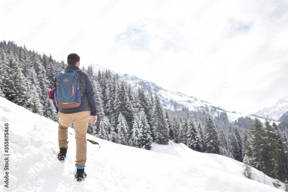 A man in the snowed mountains