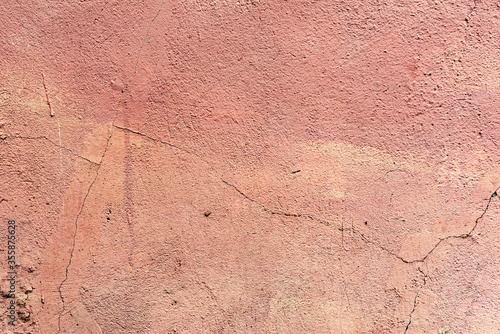 Pink cement wall texture for background and design art work