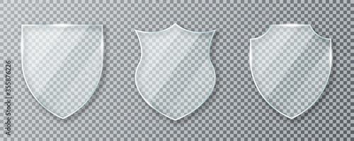 Glass shield. Set of transparent glass shields and acrylic panels. Conceptual symbol of protection, safety, security and guarding. Transparent glass shields isolated on background