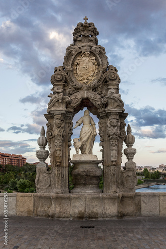 Photography of the statue of Santa María de la Cabeza (Saint Mary of the Head) on the Puente de Toledo in Madrid