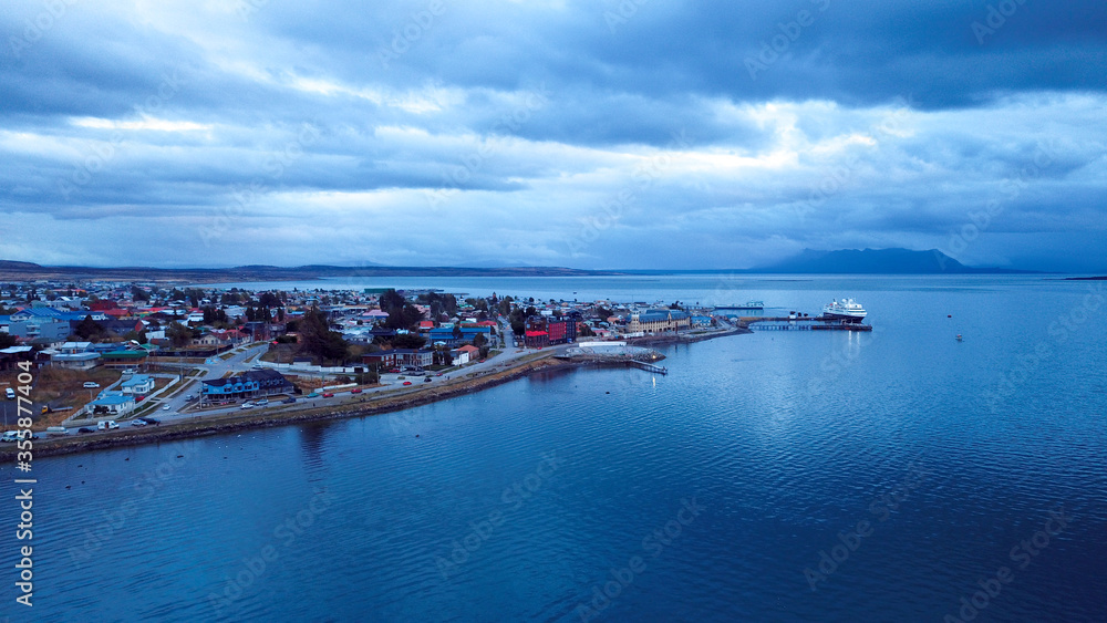Aerial View to the Panoramic View to the Puerto Natales under the Blue Sunset Sky, Chile