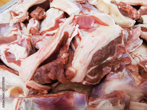Close-up view of sliced pieces of raw lamb. Meat before cooking