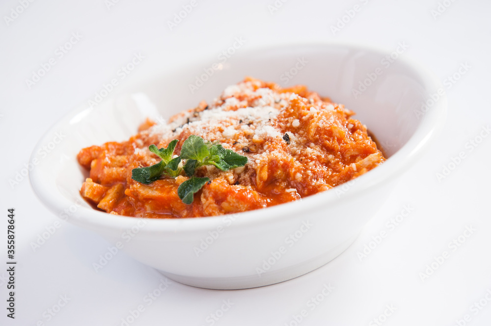 tripe with tomato and mint, roman cuisine, Lazio specialty, Italy, isolated on white background