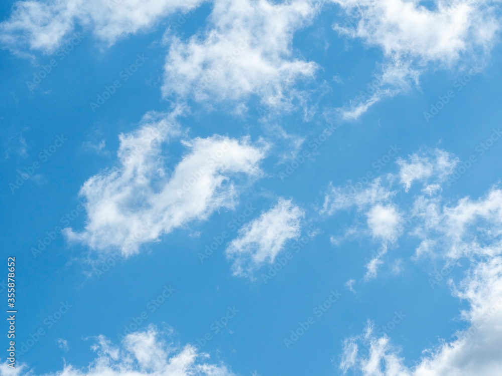blue sky with white clouds close-up. Texture, template