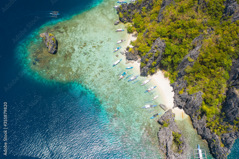 Shimizu Island, El Nido, Palawan, Philippines. Beautiful aerial view of tropical island, sandy beach and coral reef