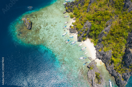 Shimizu Island, El Nido, Palawan, Philippines. Beautiful aerial view of tropical island, sandy beach and coral reef © Igor Tichonow